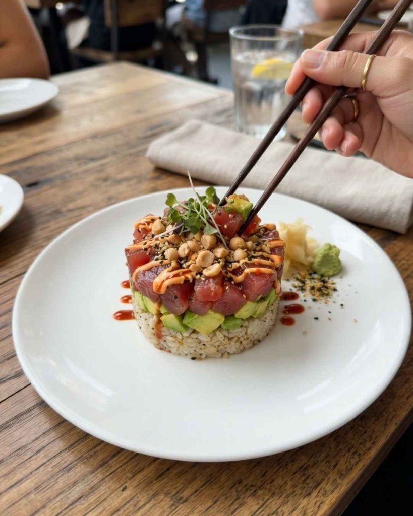 The colorful Ahi Tower appetizer featuring sashimi-grade tuna and avocado.