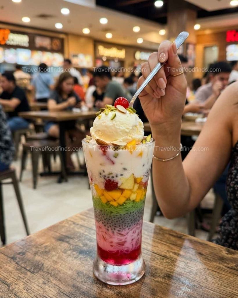 A tall glass of Royal Falooda ordered from the Mumbai Masti Juice Center.

